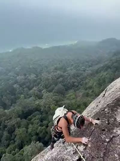Following the last slab to the belay, the south of the island behind.
